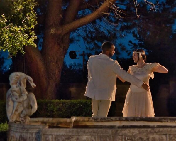 A couple embrace in Gatsby Redux