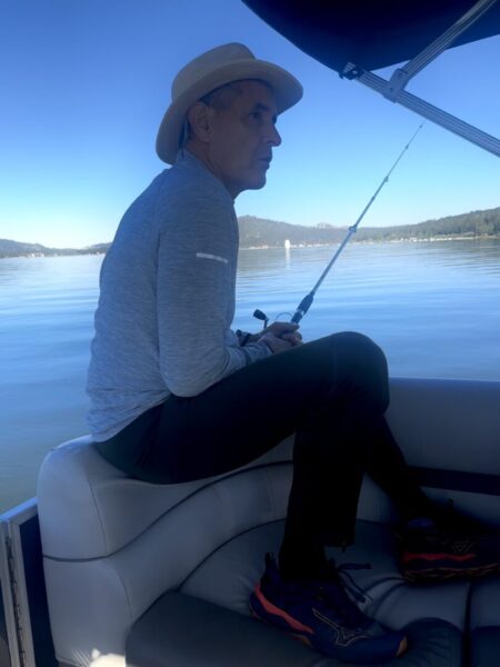 A person fishing in a boat