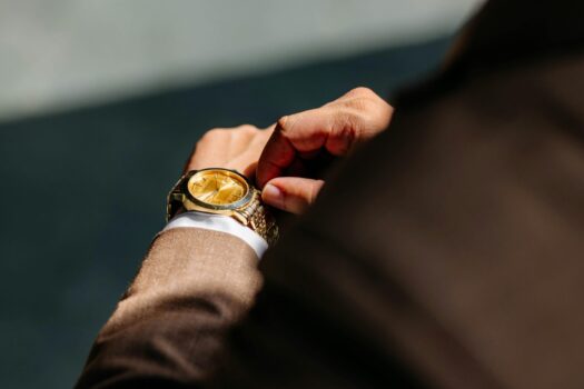 Man wearing luxury watch.