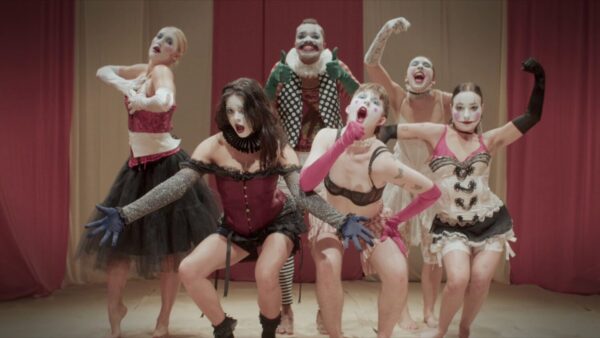A group of clowns pose
