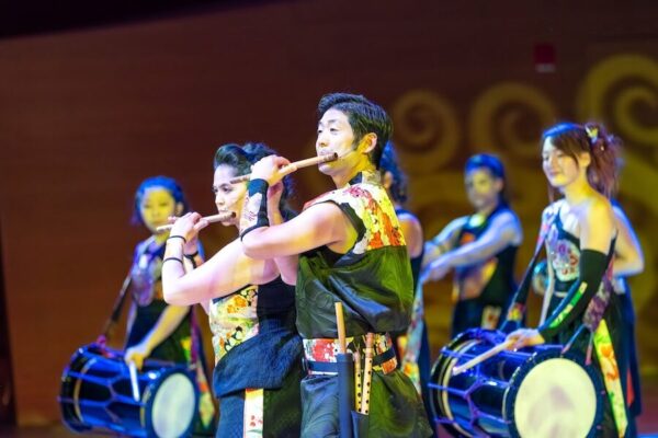 TaikoProject artistic director Masato Baba plays the flute.