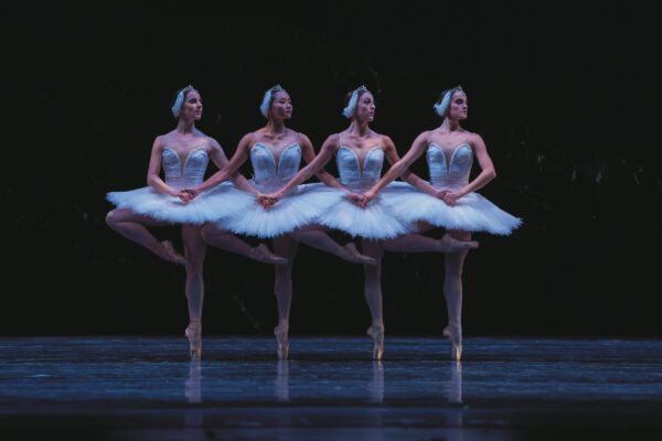 Four dancers in tutus for San Francisco Ballet.