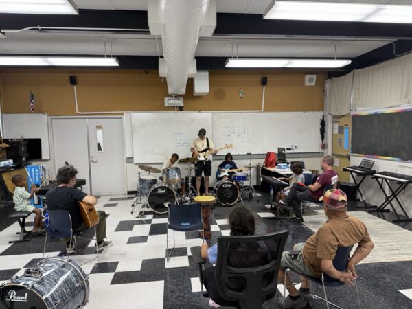 playing music at The Watts Conservatory of Music