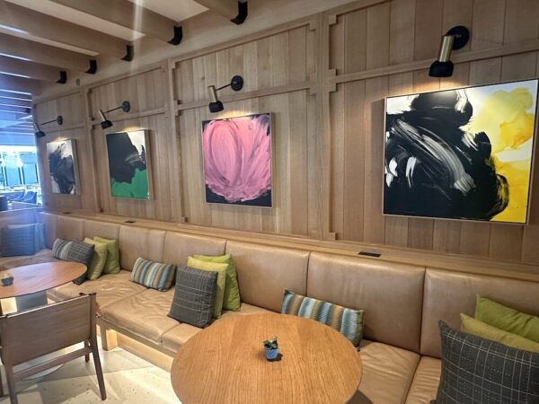 Paintings in a lounge by Uruguayan artist Monica Perez