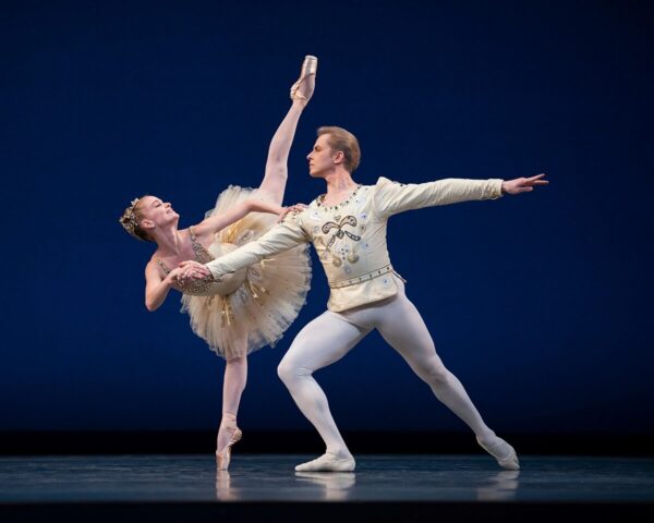 Two dancers pose