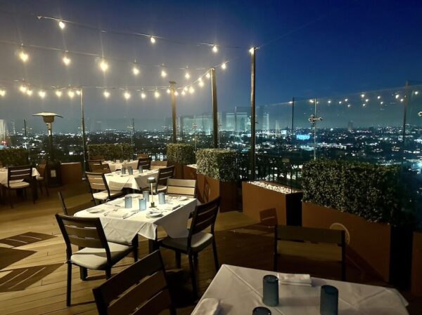 Rooftop dining has wrap-around views.