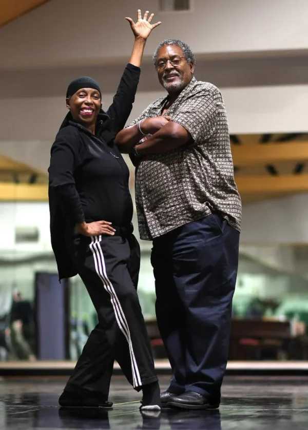 Two people looking at camera