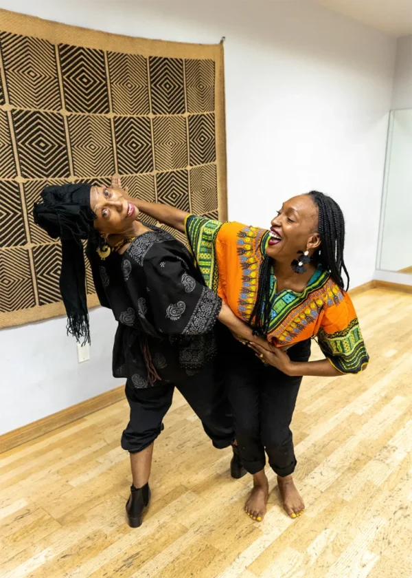 Two dancers being playful