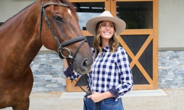 woman with horse promoting clothing