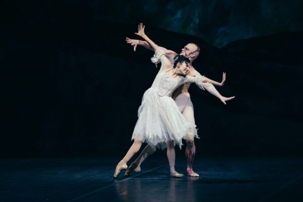 Two dancers in white