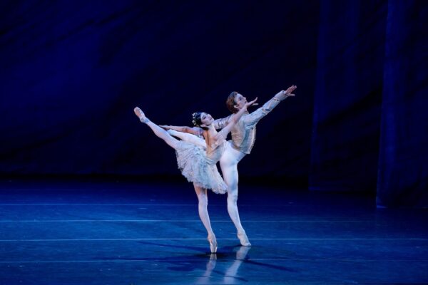 Two dancers in white