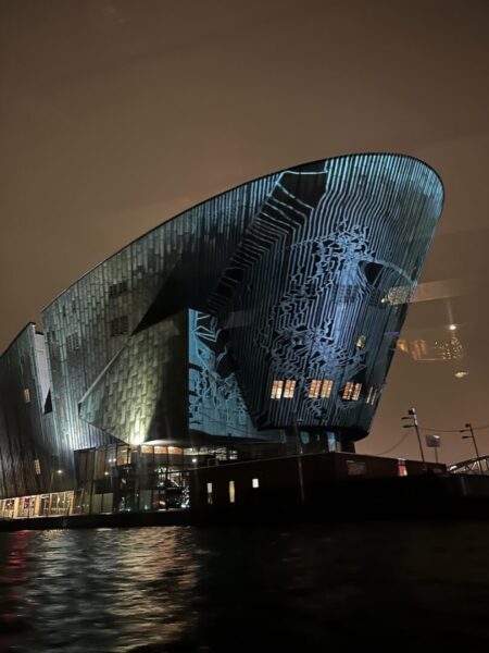 Filip Roca’s piece, “Fracture Point,” a massive light projection covering the Nemo Science Museum in Amsterdam.