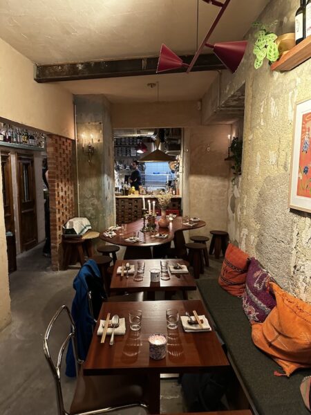 Tables in the narrow Familjen restaurant