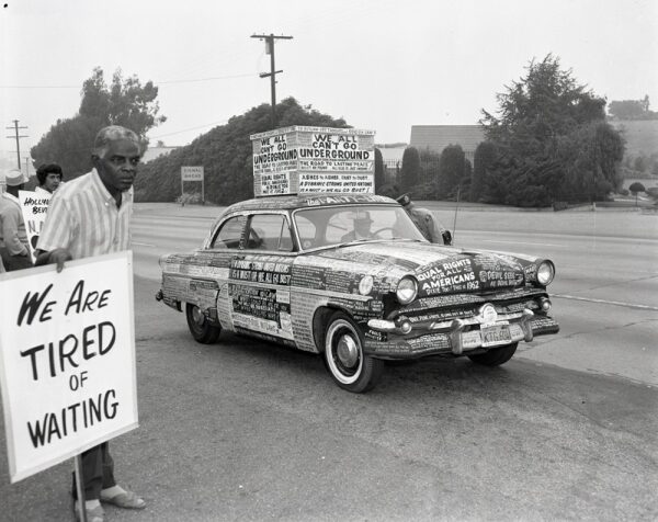 Harry Adams (1918–1985), Protest Car, Los Angeles, 1962, printed 2024, inkjet print; Harry Adams Archive, Tom & Ethel Bradley Center, California State University, Northridge, © Harry Adams, all rights reserved and protected.