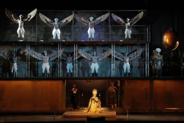 Yuntong Han (bottom center) as the High Priest of Amon in LA Opera's 2026 production of Akhnaten, flanked by Vinicius Costa (bottom left) as Aye and Hyungjin Son (bottom right) as Horemhab. Photo credit: Cory Weaver