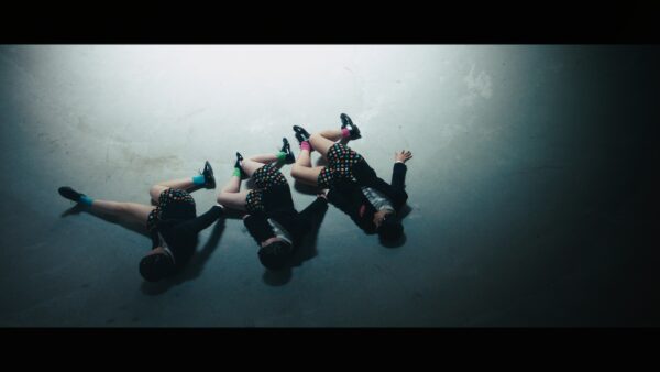 Three figures seen from overhead. The Seaweed Sisters. Still from