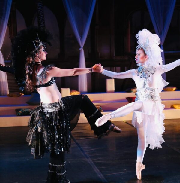 A dancer in black and a dancer in white