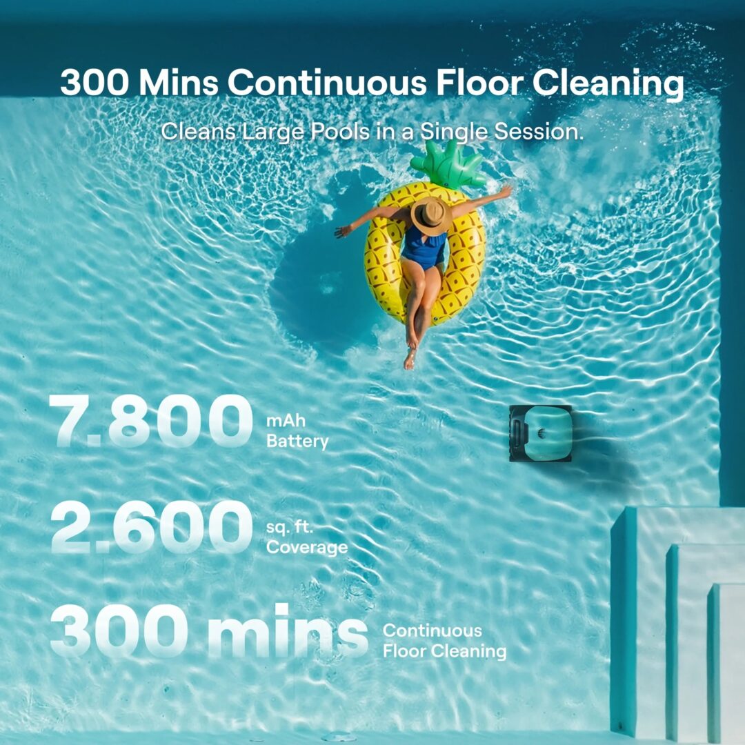 Aerial view of a woman floating on a pineapple ring in a bright blue pool beside a small teal device