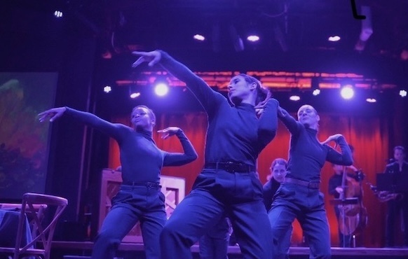 Three dancers in blue