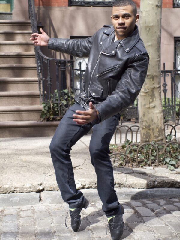 A male tap dancer on his toes