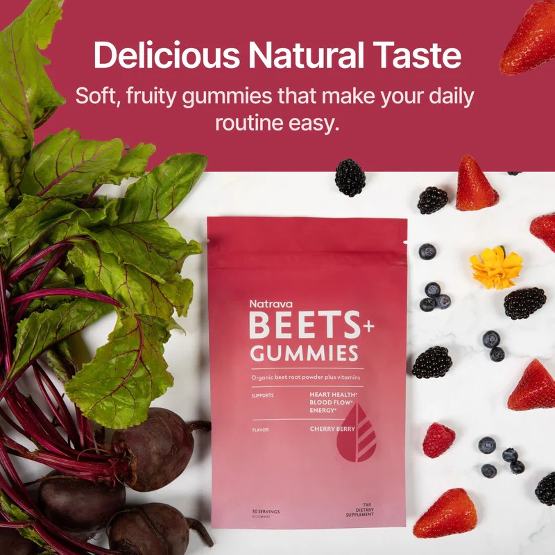 CD-Insert1 Red pouch of Natrava Beets+ Gummies surrounded by fresh beets, strawberries, blueberries, and blackberries on a white surface