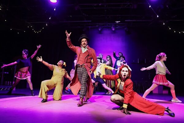 A ringmaster surrounded by circus