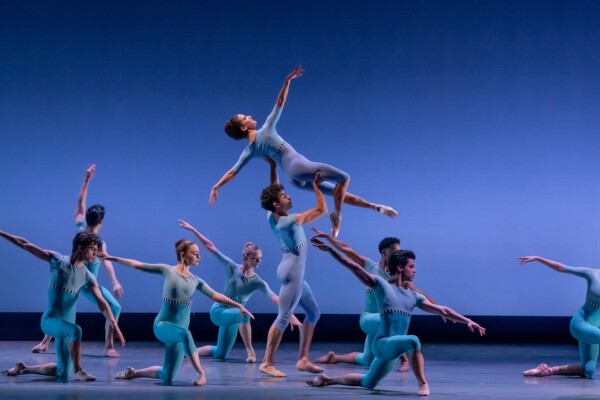 A group of dancers in blue