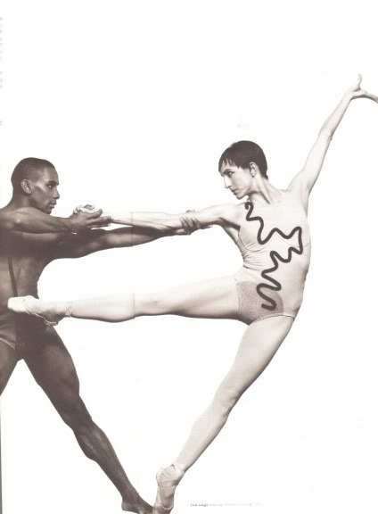Two dancers lean away