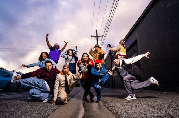 Dancers pose outdoors
