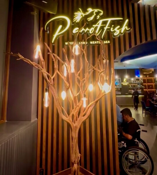 Resort restaurant sign ParrotFish