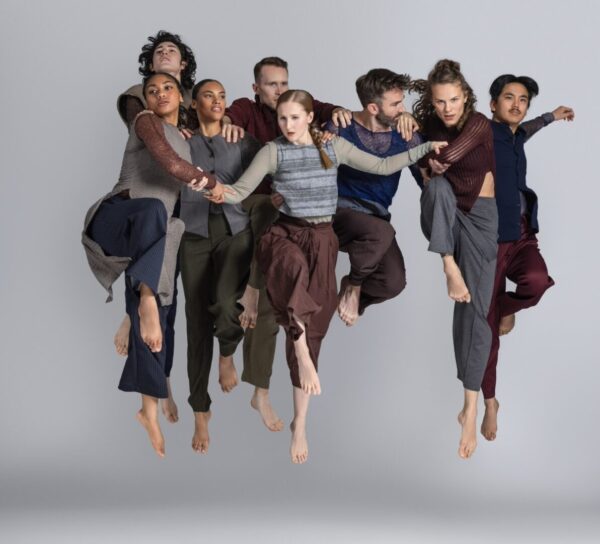 A group of dancers jump